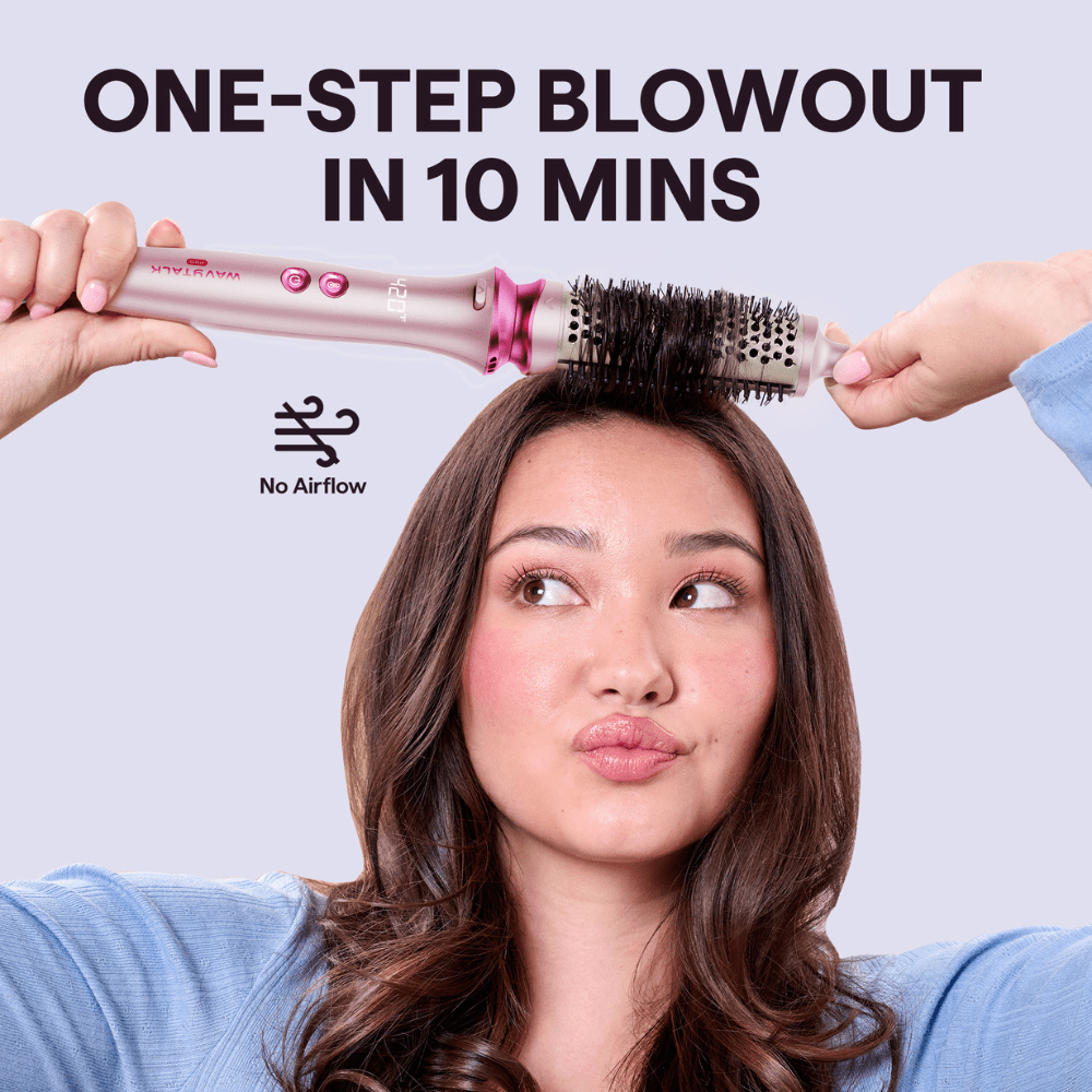 Woman using gray Heatwave Pro hair styling tool with text 'One-Step Blowout in 10 Mins' on a light blue background